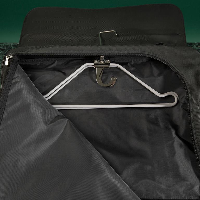 A Garment bag by Louis Vuitton.