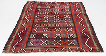 A Kelim carpet, c. 300 x 170 cm.