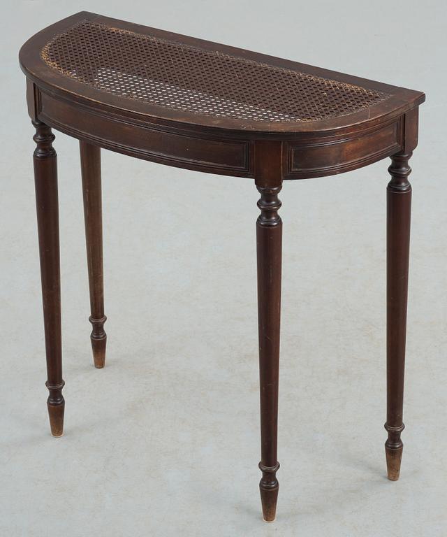 A stained birch console table, with rattan top, NK, Sweden 1920's.