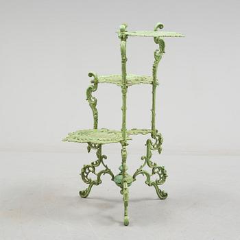An early 20th century cast iron shelf.