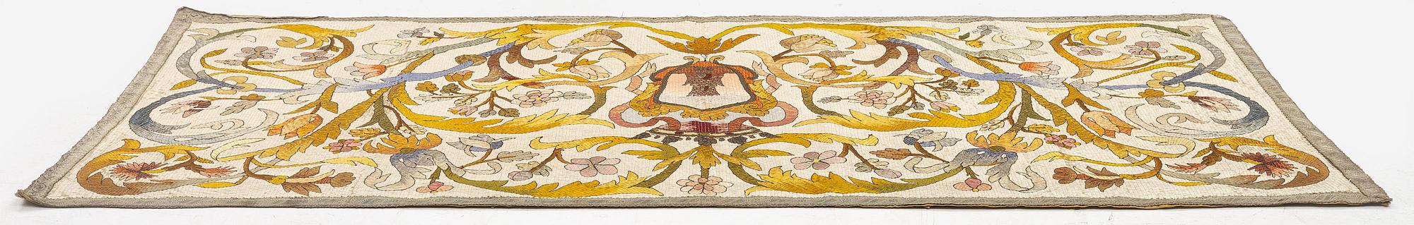 An antique silk embroidery, c. 187 x 88, around the year 1900.
