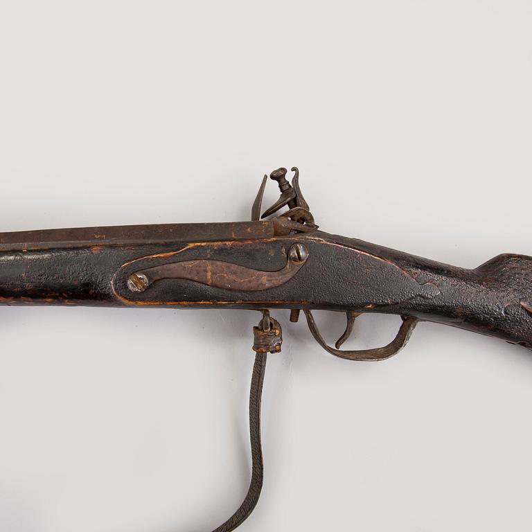 An early 19th century flintlock rifle.