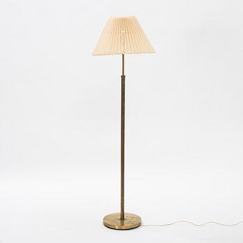 A brass floor light, seond part of the 20th Century.