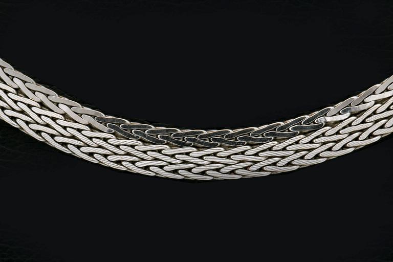 An 18K white gold chain, Unoaerre, Italy, 27g.
