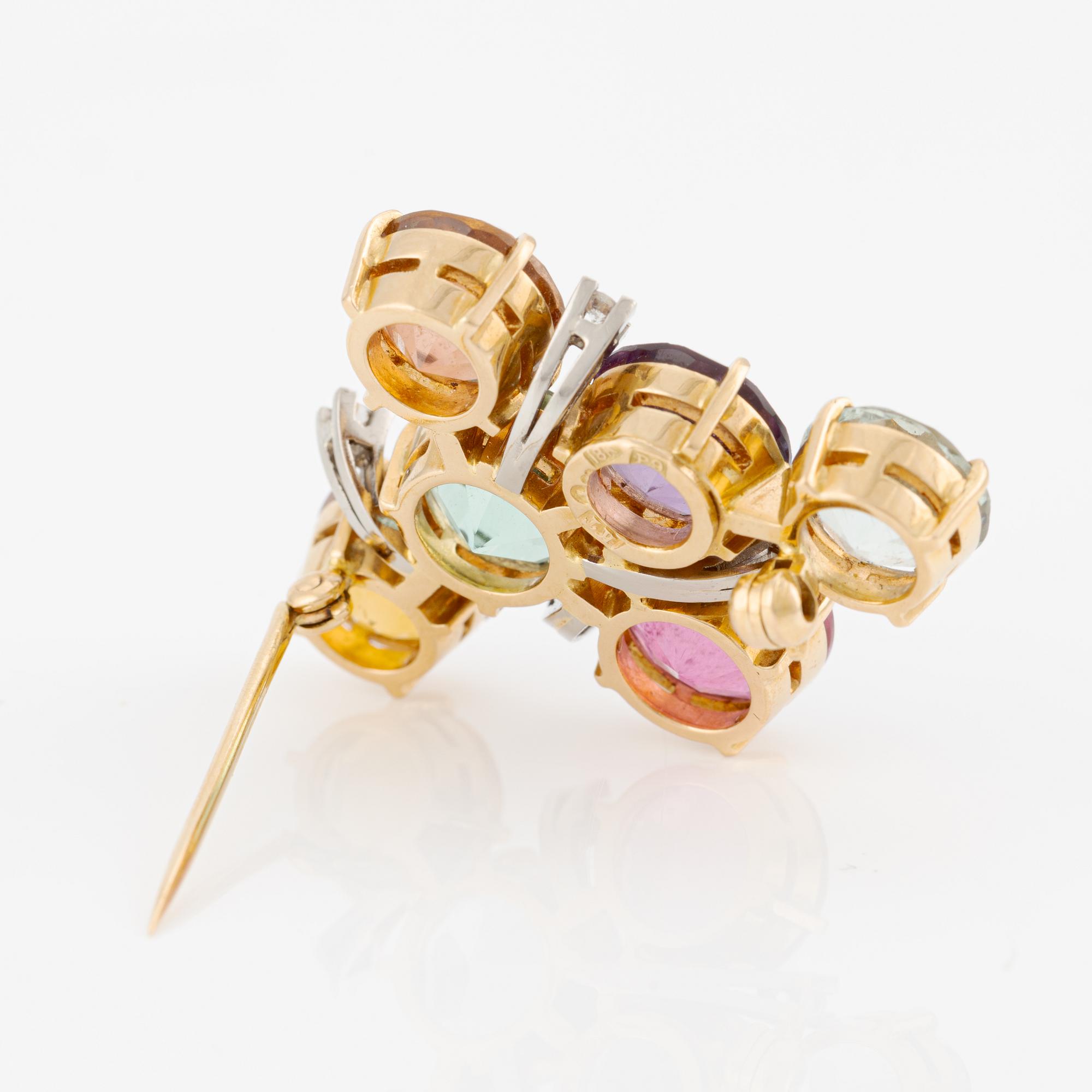 Brooch in 18K gold with faceted coloured stones, including tourmalines and round brilliant-cut diamonds.