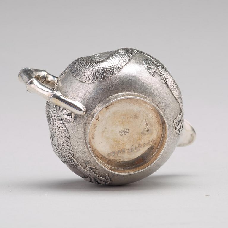 A Chinese four piece silver tea set, Luen Wo, Shanghai, 1875-1925.