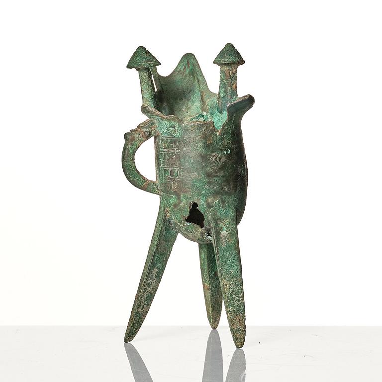 A bronze ritual wine vessel, jue and a bowl, possibly Shang and Ming dynasty.