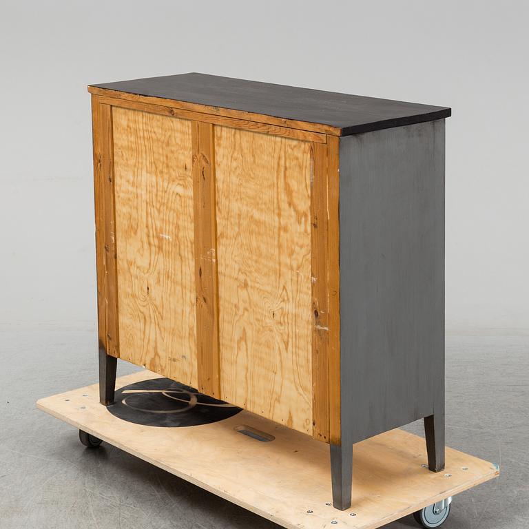 A chest of drawers from the first half of the 20th century.