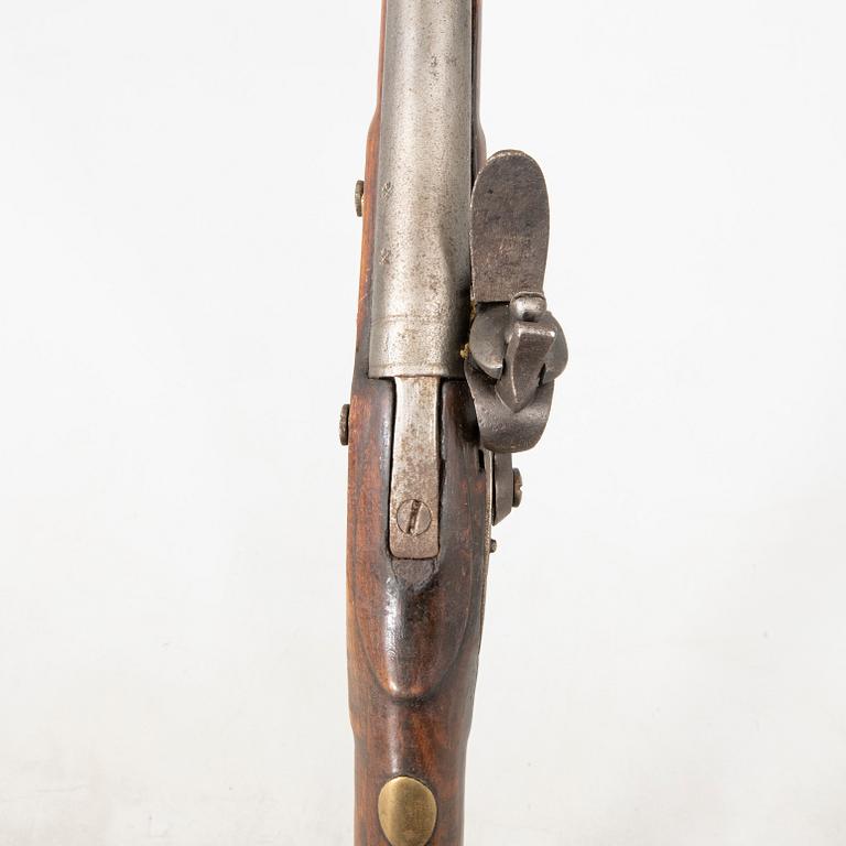 A British flintlock gun, 18th century.