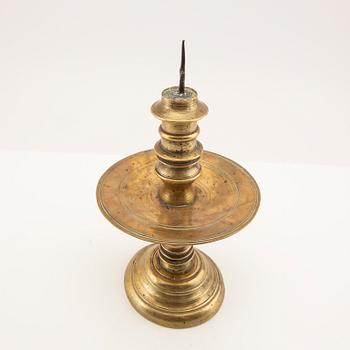 Candle holder possibly from the 17th century, brass.