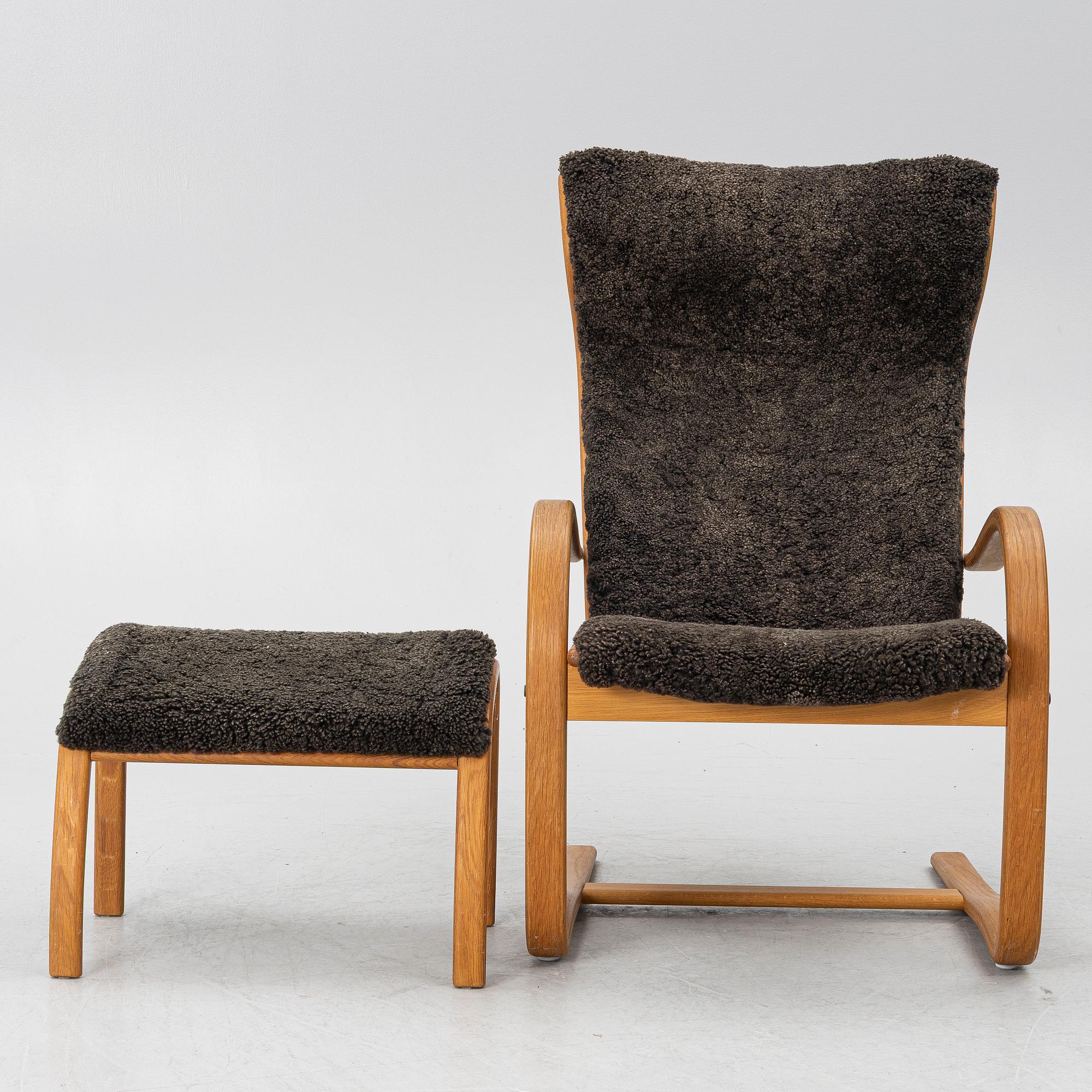 Jan Ekström, a "Gazell" armchair with a footstool, 21st century.