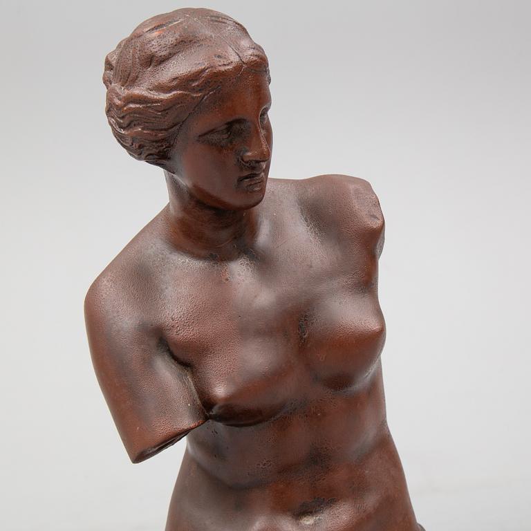 A 20th century painted plaster sculpture.