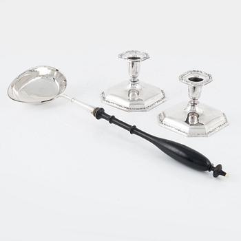 A Swedish Silver Ladle, mark of Adolf Öström, Piteå 1887 and a pair of Silver Candlesticks.