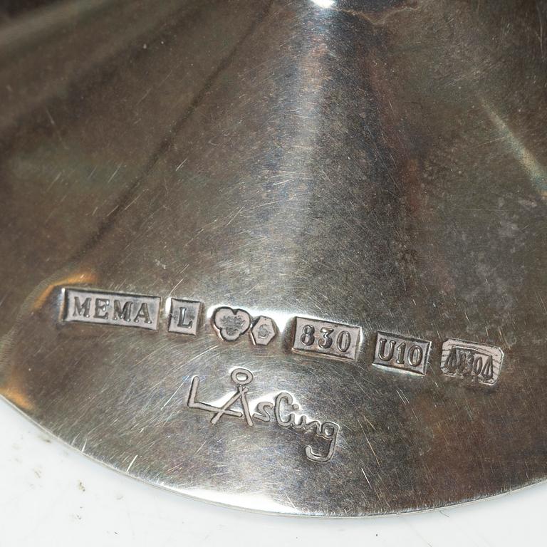 Two vodka glasses, one in silver by Lars Åsling, 1994, and one in pewter, 1977.