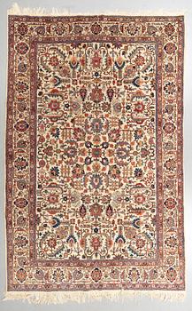 A carpet, semi-antique Tabriz,  342 x 231 cm.