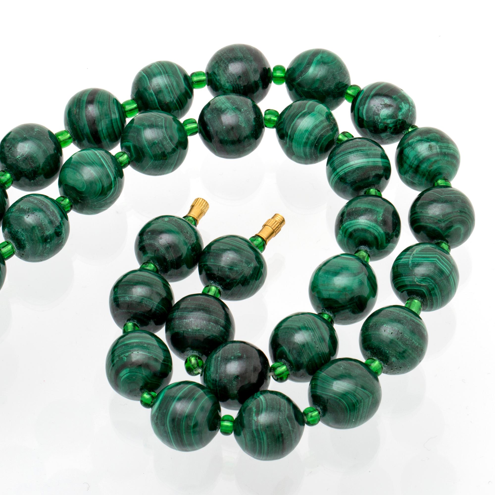 Malachite necklace, beads approx 15 mm and glass beads, approx 80 cm,  clasp metal.