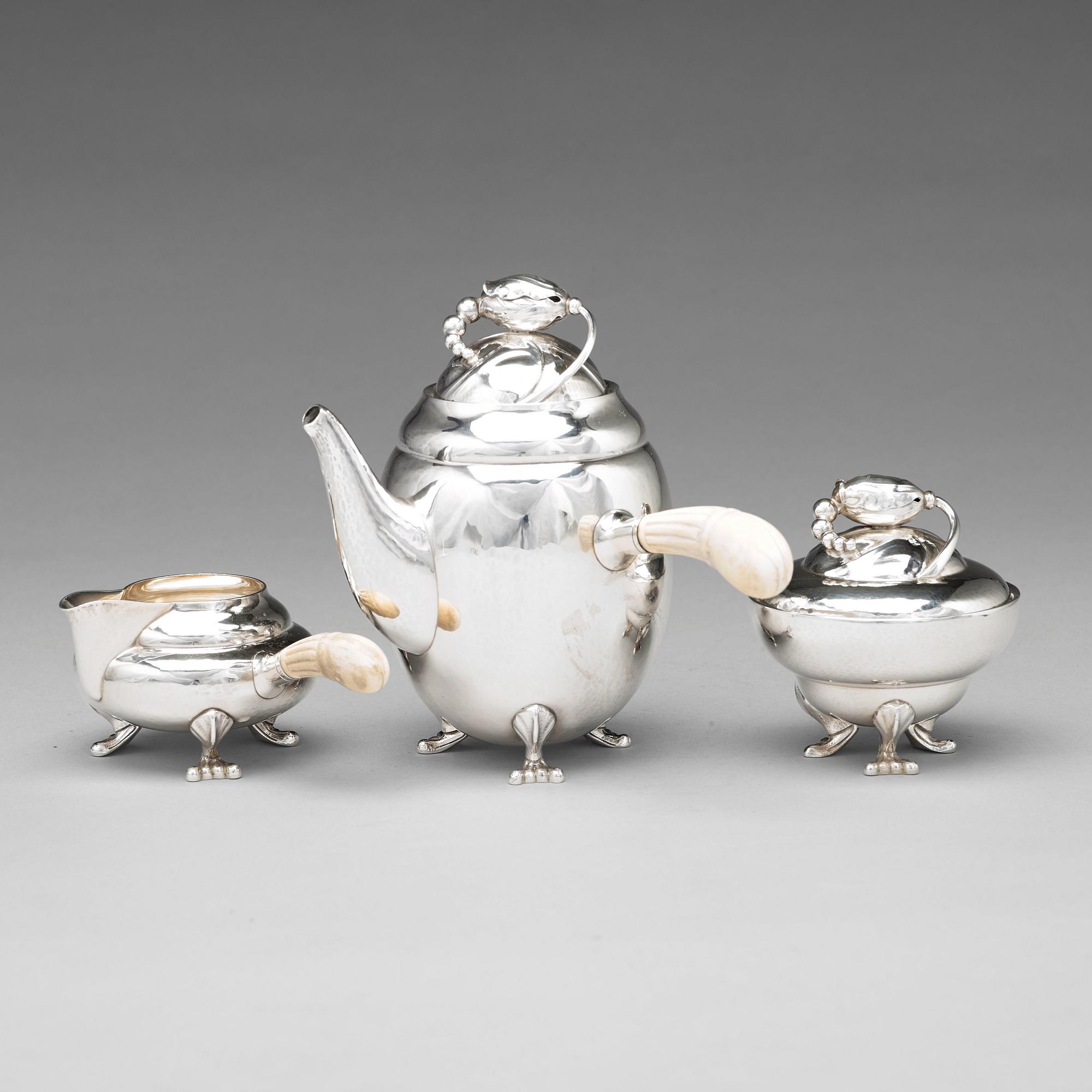 Georg Jensen, a three pieces of "Blossom" sterling silver coffee service, Copenhagen 1933-51, design nr 2A and 2C (sugar bowl).