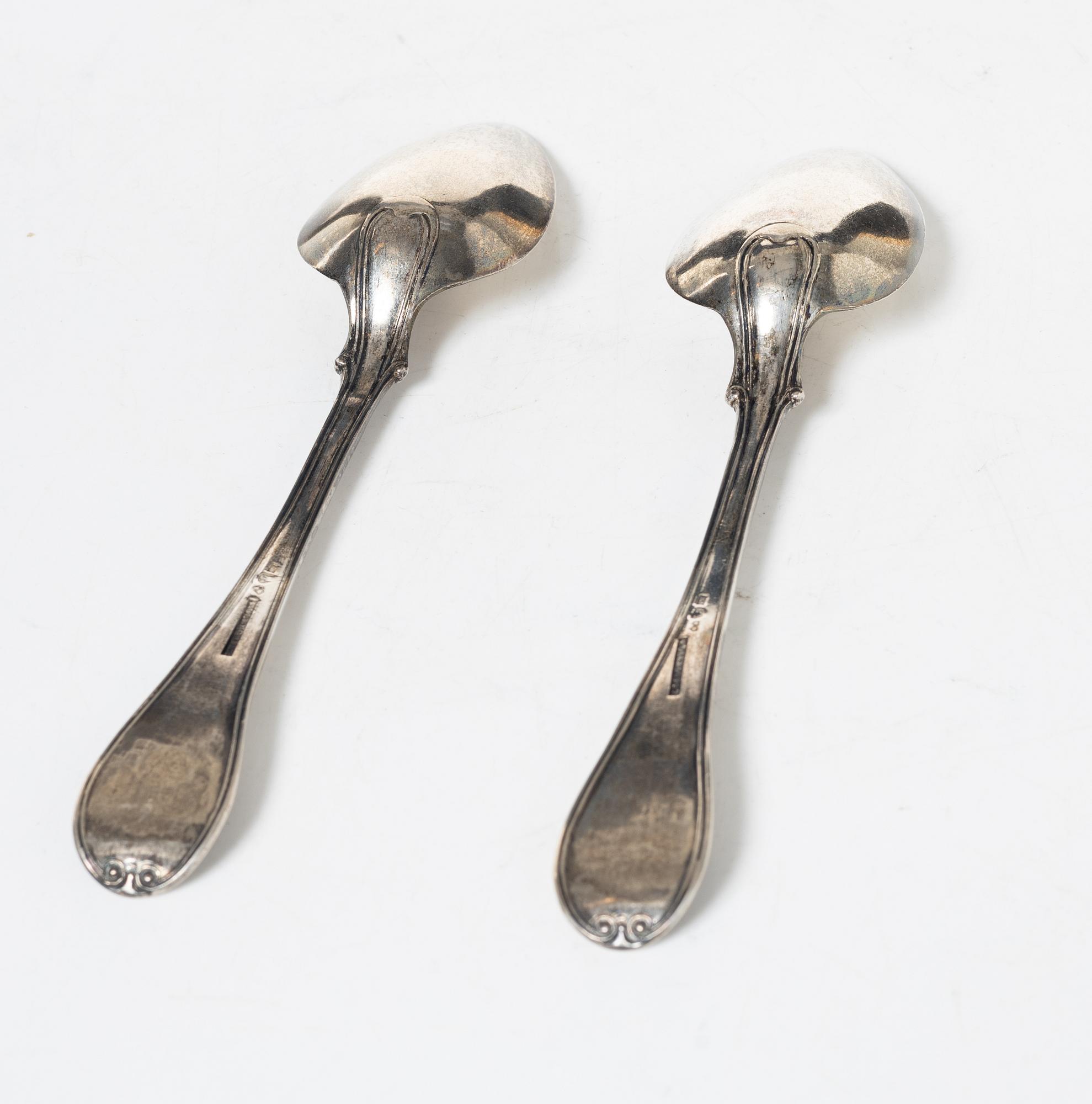 A set of twelve Swedish silver spoons, including Adolf Zethelius, Stockholm 1826.