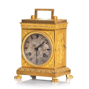 A late empire mantel clock, mid 19th century.