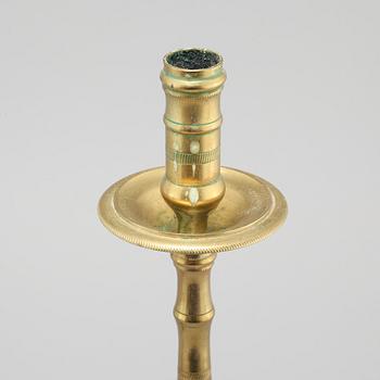 A pair of brass candlesticks, made around year 1900.