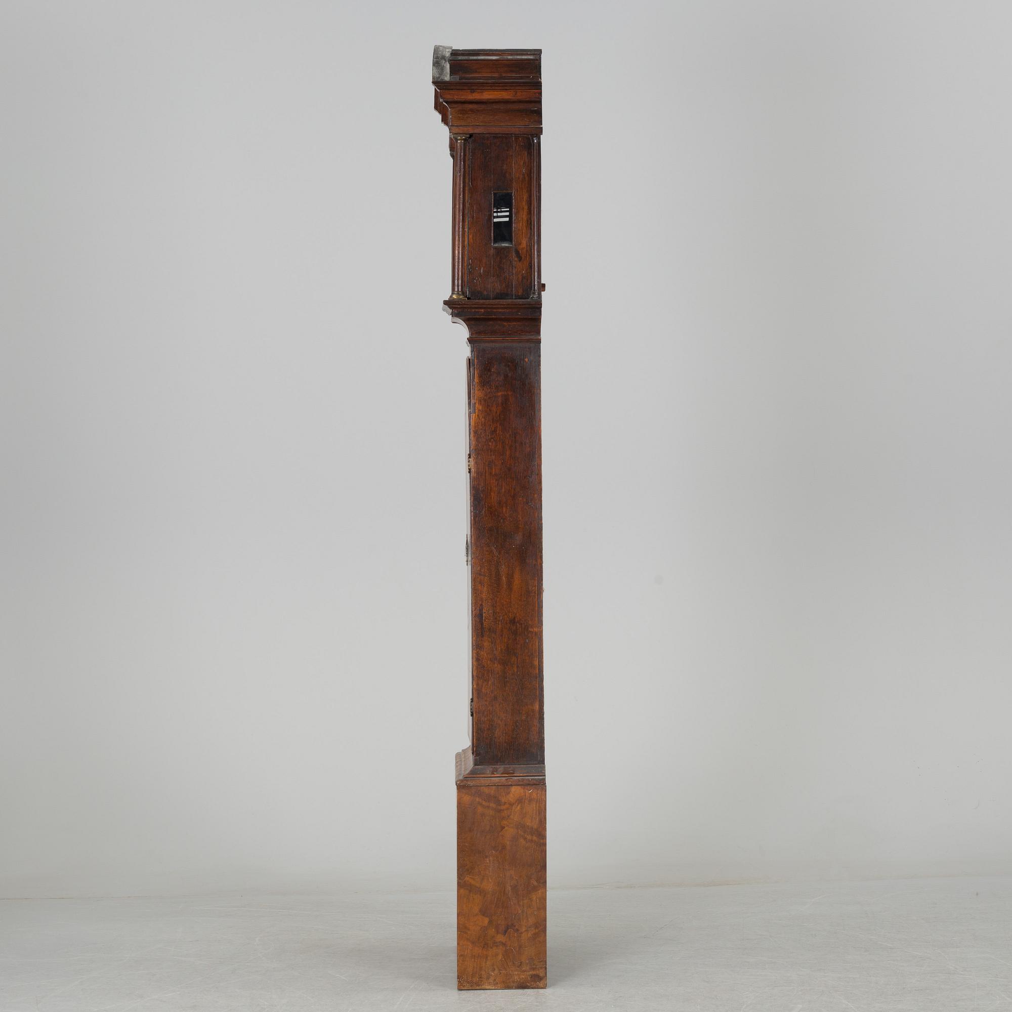 A WALNUT LONGCASE CLOCK, Benjamin Stretch, Bristol, 18th century.