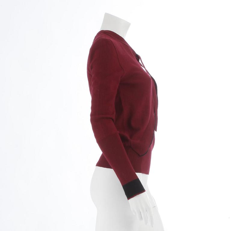 SONIA RYKIEL, a burgundy red wool sweater.