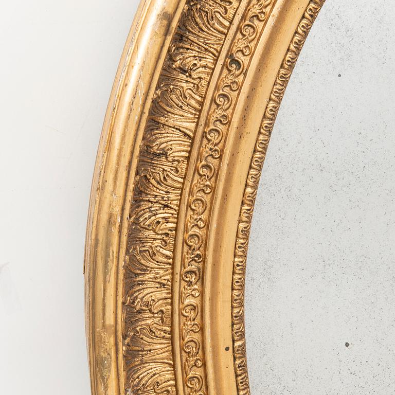A late empire gided mirror mid 1800s.