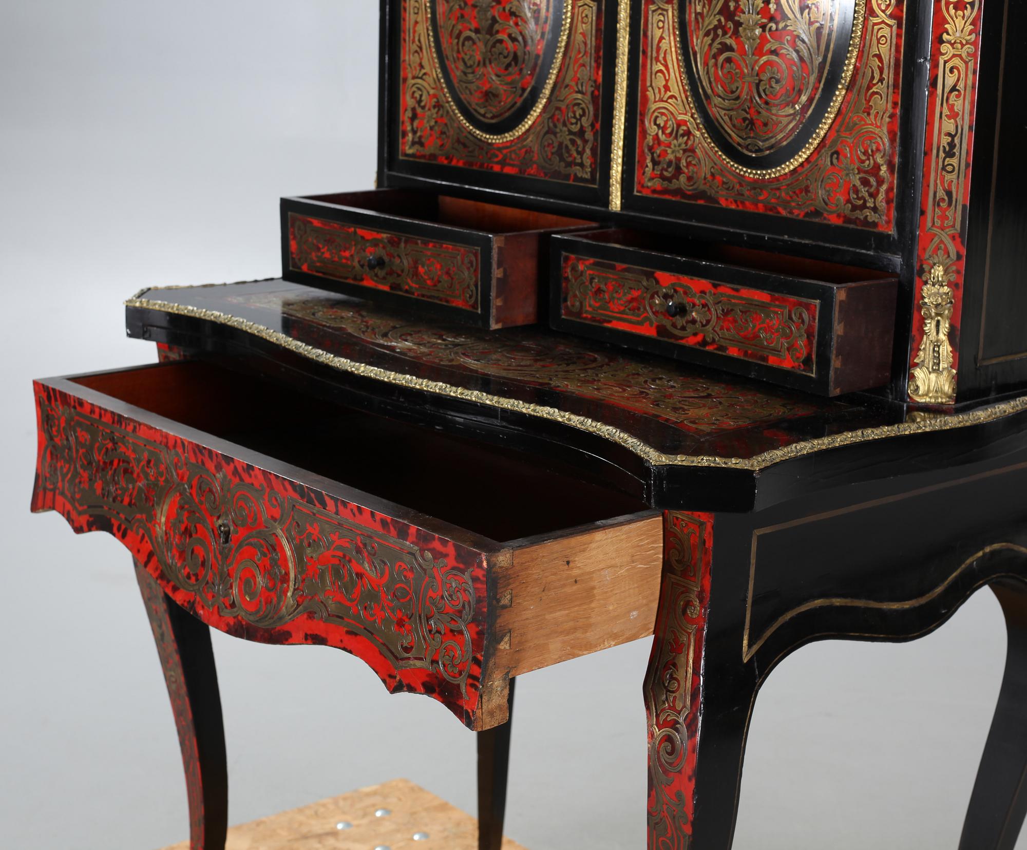 A Boulle style escritoire from the first half of the 20th century.
