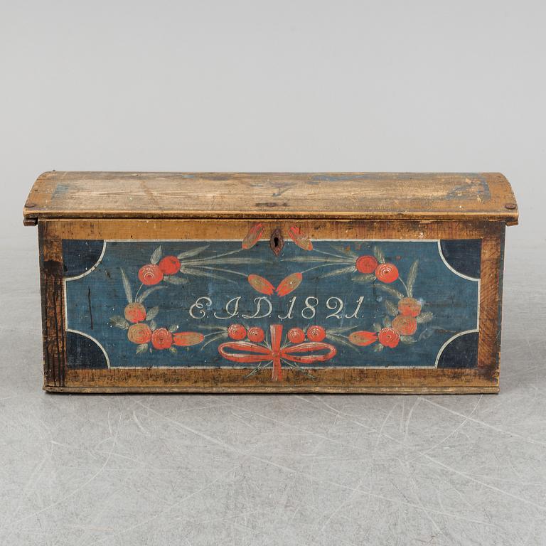 A painted pine chest from Bohuslän, dated 1821.