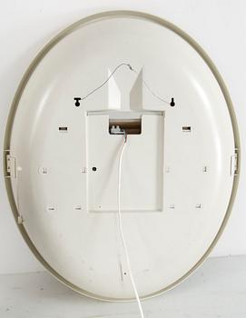 A "SPACE AGE" WALL MIRROR WITH LIGHT BY ALLIBERT, 1970s.