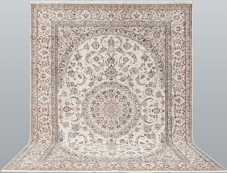 A Nain part-silk carpet, 395 x 293 cm.
