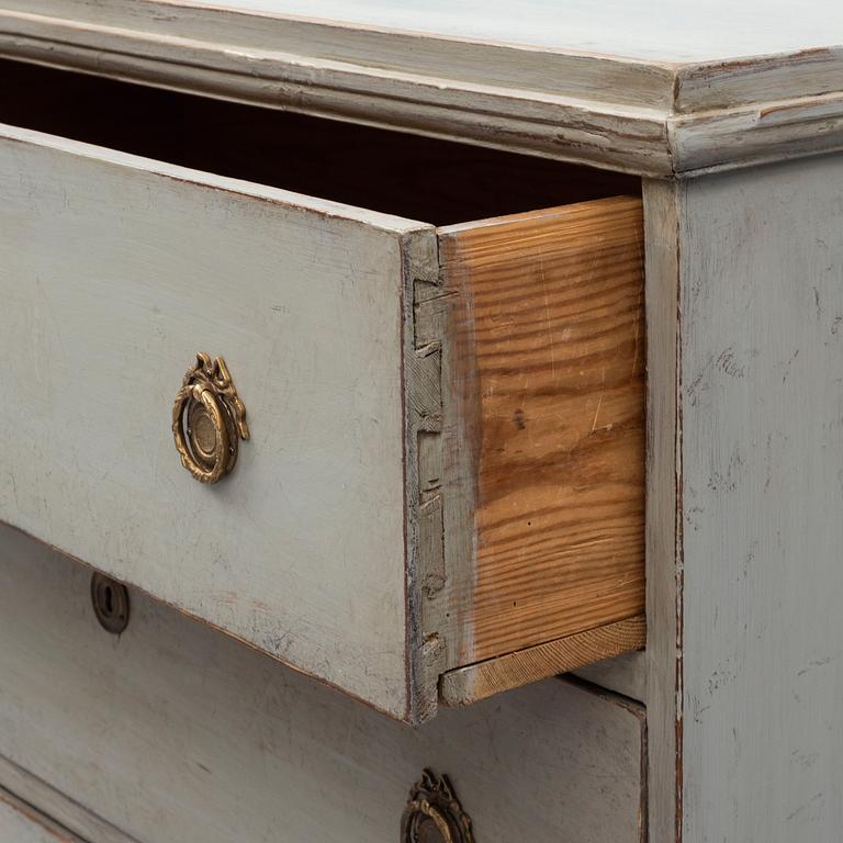 A mid 19th century painted chest of drawers.