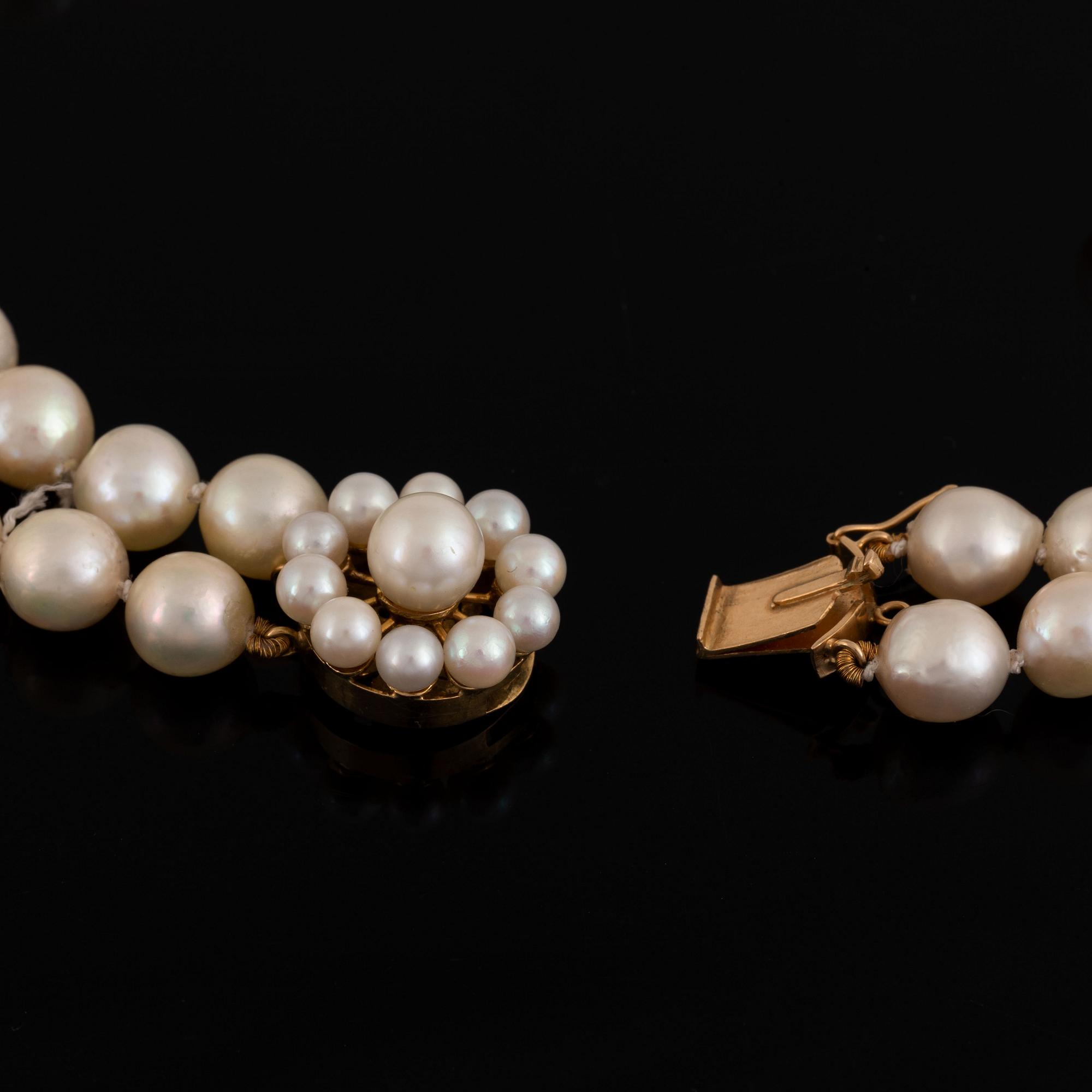 A two strand cultured pearl necklace.