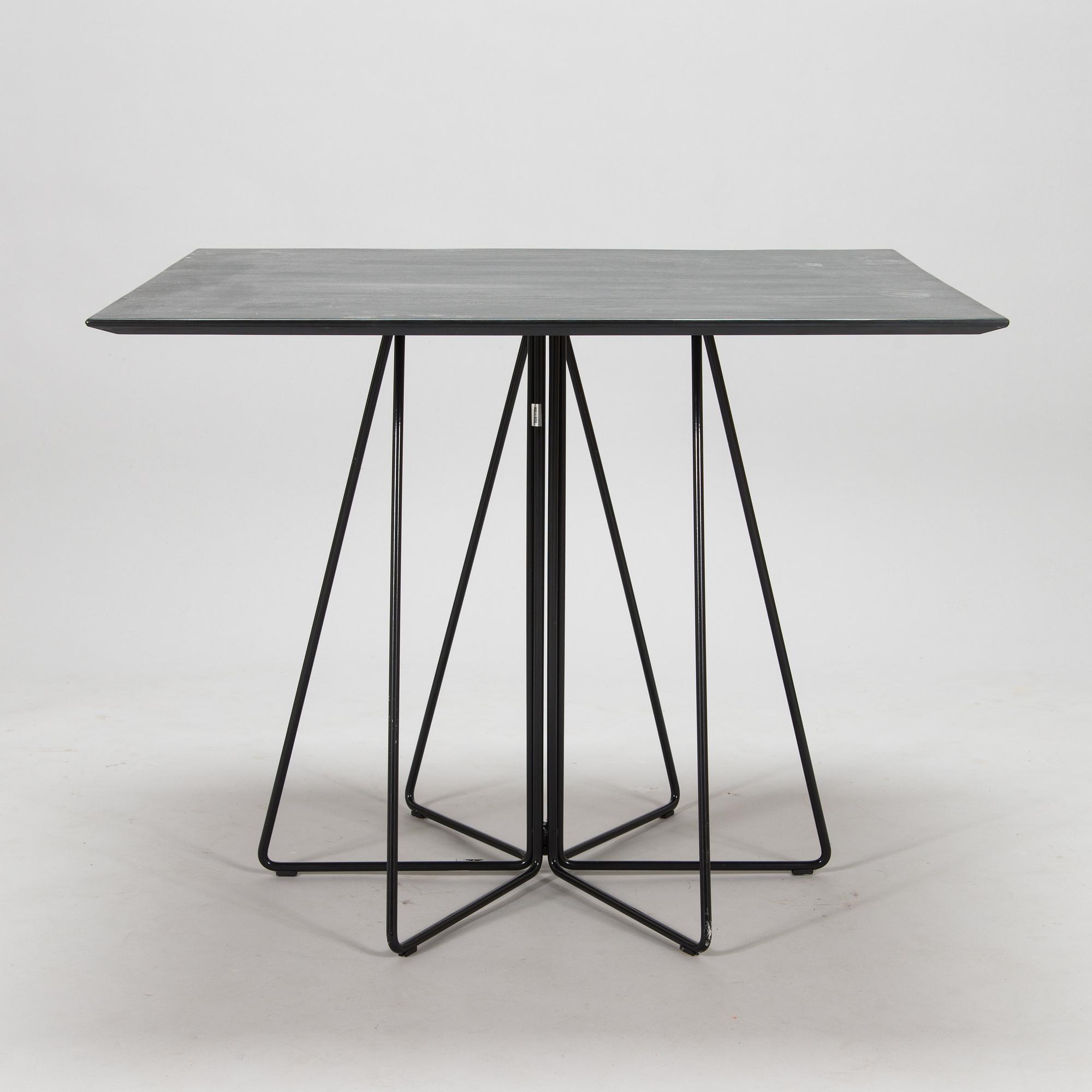 Lella and Massimo Vignelli, A "Paperclip" table in slate from Knoll 1994.