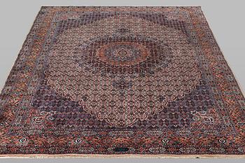A carpet, Moud, signed, ca 385 x 268 cm.