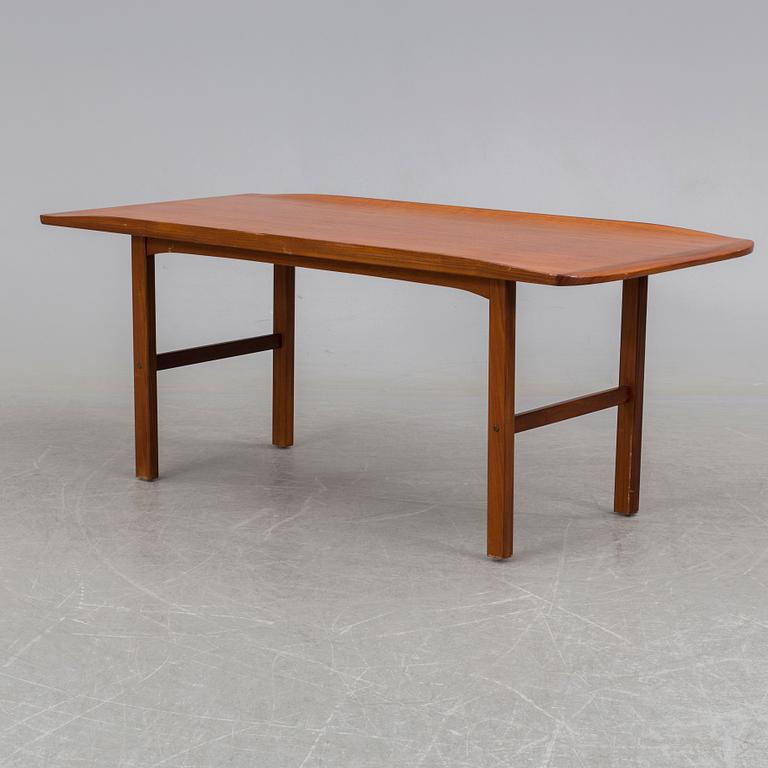 a late 20th century teak table.