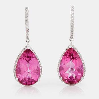 586. A pair of drop-shaped pink tourmaline and brilliant-cut diamond earrings.