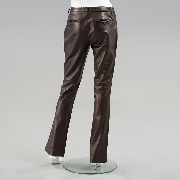 Apair of dark brown leather pants by ralph lauren.