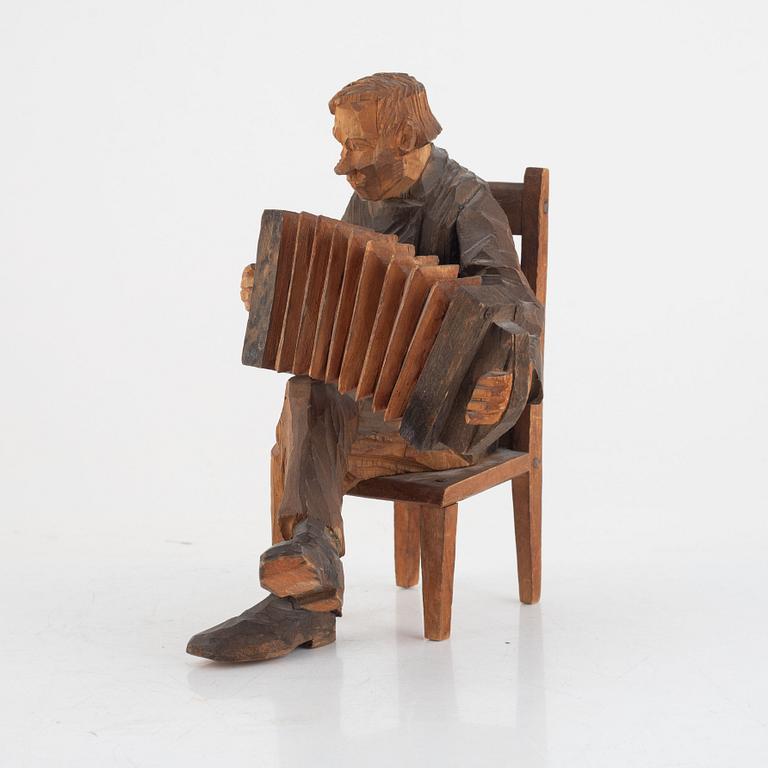 Axel Petersson Döderhultarn, Seated Accordion Player.