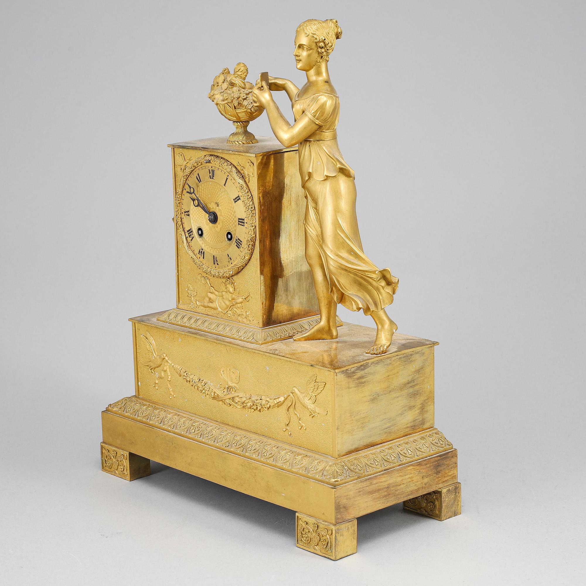 An Empire mantel clock, beginning of the 19th ct.