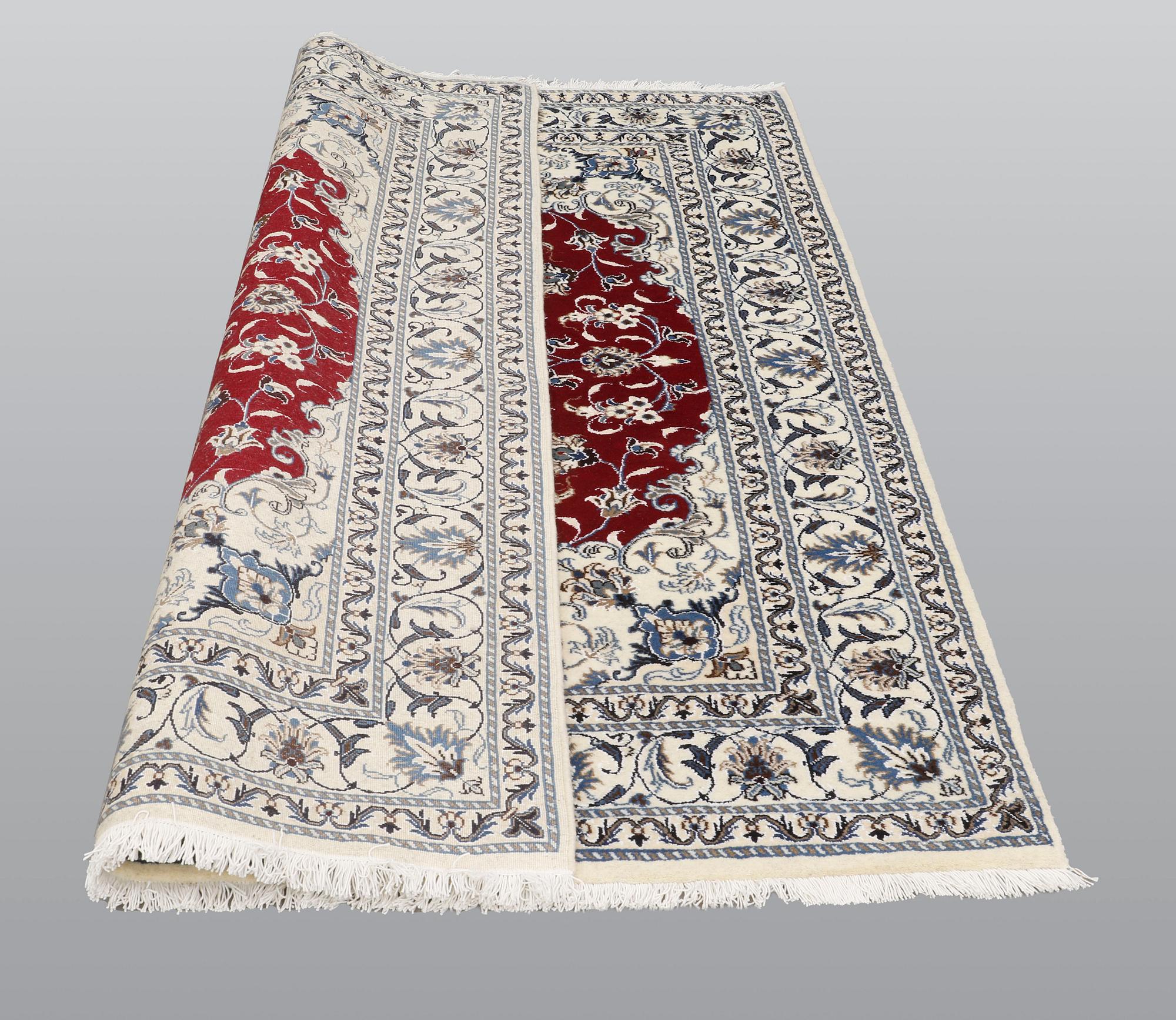 A rug, Nain part silk, ca 208 x 149 cm.