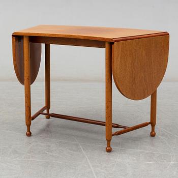 JOSEF FRANK, a model 1333 mahogany table from Firma Svenskt Tenn.