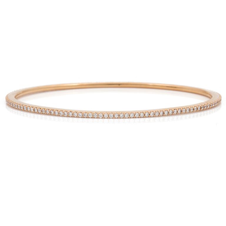 A brilliant cut diamond "Love bracelet" bangle by Ole Lynggard.