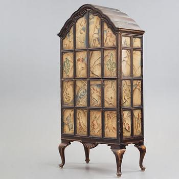 Tor Hörlin, a Swedish Grace decorated oak cabinet, dated 1920.