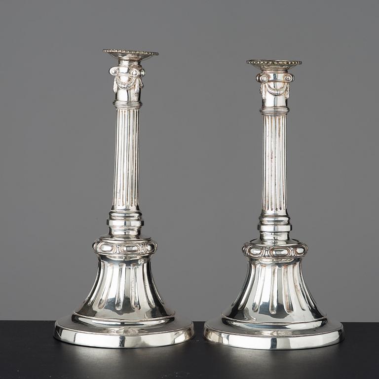 Two similar Gustavian late 18th century candlesticks.