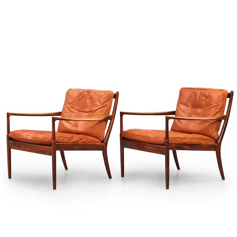 Ib Kofod Larsen, a pair of "Samsö" palisander and brown leather easy chairs, Olof Persons Fåtöljindustri (OPE) Sweden 1960's.