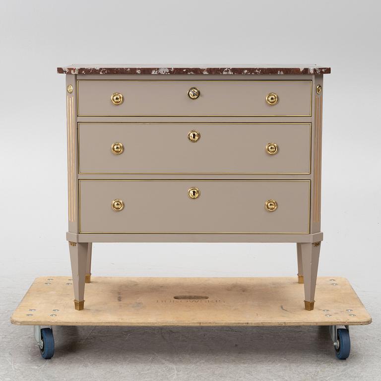 A Gustavian style chest of drawers, Mid 20th Century.