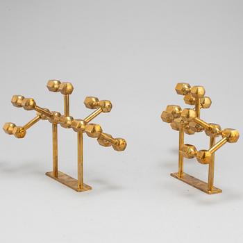 A pair of brass wall candelabras, for Gusum, signed BK and dated 1995 and 1997.