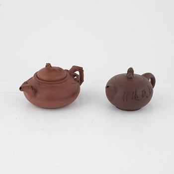 Two Yixing teapots, China, 20th century.
