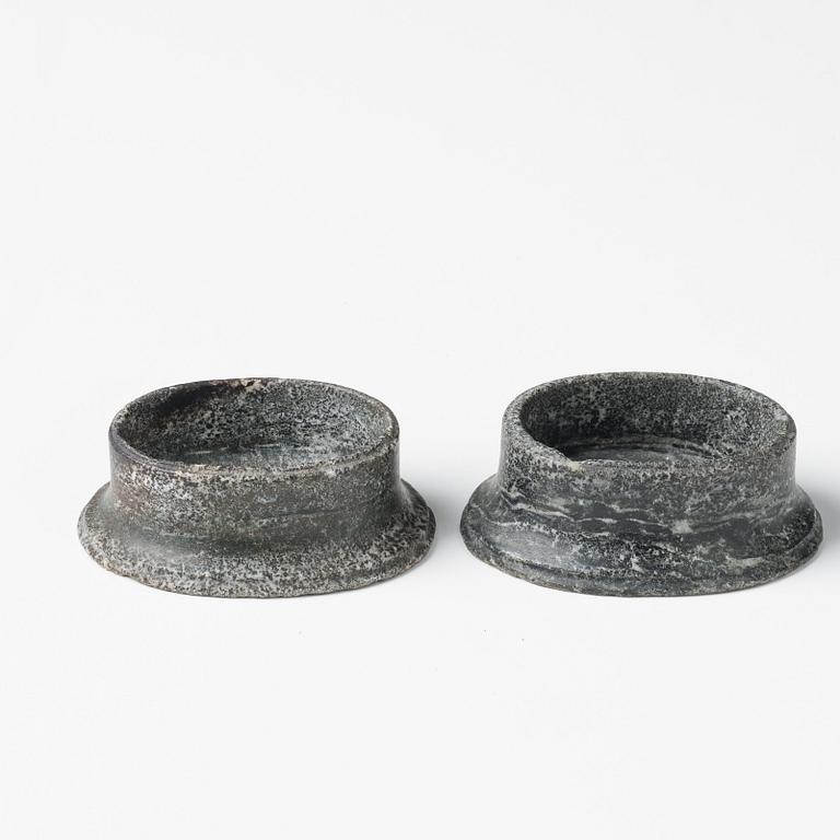 A pair of Swedish Empire 'Kolmård' marble salts, early 19th century.